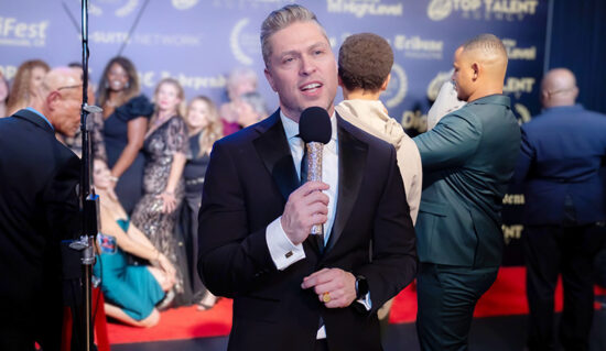 Sir David T. Fagan on the red carpet during the event
