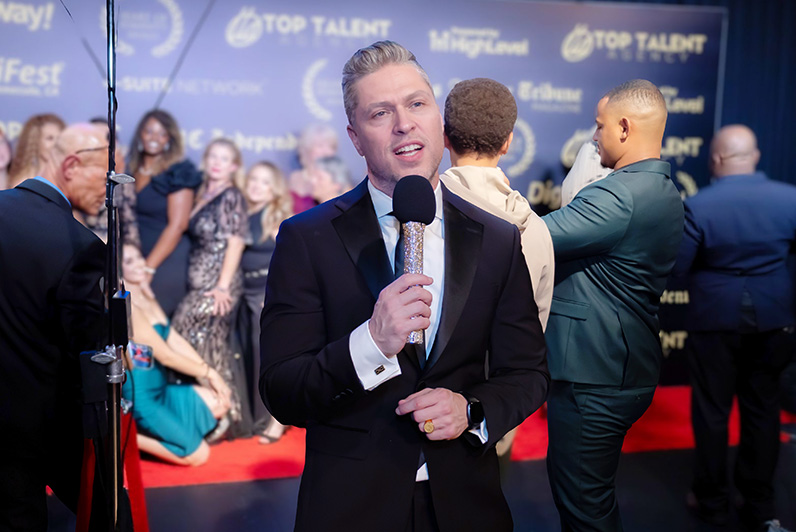 Sir David T. Fagan on the red carpet during the event